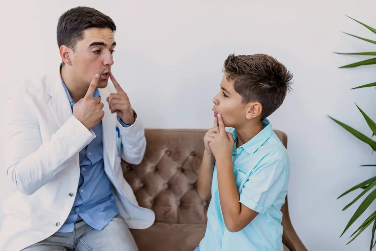 Child navigating mild autism with speech delay and echolalia